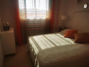 Postel nebo postele na pokoji v ubytování Meerblick Casares del Sol