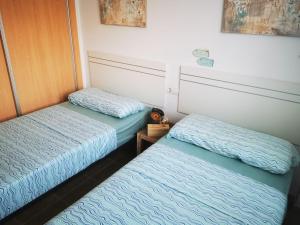 Postel nebo postele na pokoji v ubytování Meerblick Casares del Sol
