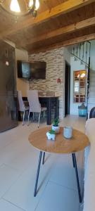 A television and/or entertainment centre at Arhontiko Katerina Spili