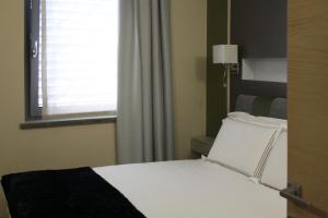 Postel nebo postele na pokoji v ubytování Molino Vecchio