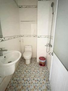 Koupelna v ubytování HALA Hotel