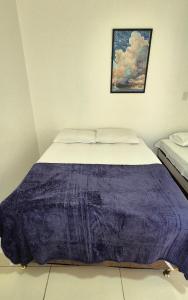 Postel nebo postele na pokoji v ubytování Pousada Das Flores