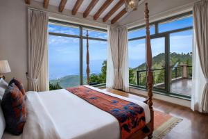 Postel nebo postele na pokoji v ubytování Larisa Resort, Mussoorie