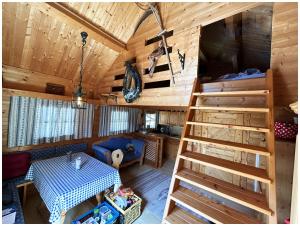 a room with a staircase in a cabin at Hike 'n Bike Base in Bad Kohlgrub