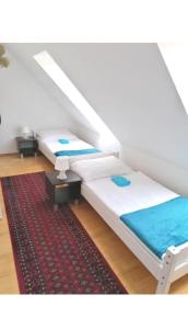 Postel nebo postele na pokoji v ubytování Vienna Rooms Nr 15