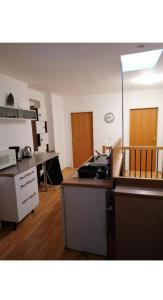 Kuchyň nebo kuchyňský kout v ubytování Vienna Rooms Nr 15