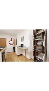 Kuchyň nebo kuchyňský kout v ubytování Vienna Rooms Nr 15