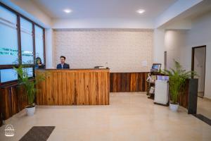 Ο χώρος του λόμπι ή της ρεσεψιόν στο Hotel Mazong Crest