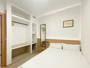Postel nebo postele na pokoji v ubytování La Terracita de Luxury Flats MTGG by Clabao