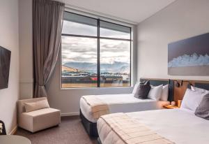 Sudima Queenstown Five Mile客房内的一张或多张床位