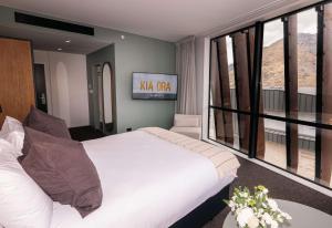 Sudima Queenstown Five Mile客房内的一张或多张床位