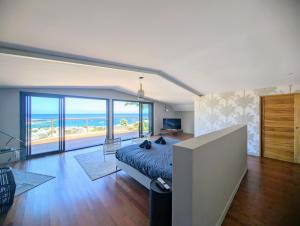 Posezení v ubytování Luxueuse Villa Calypso - Piscine et vue mer