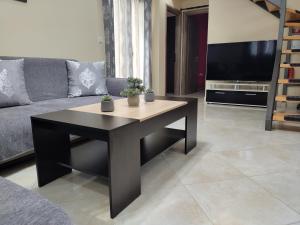 A television and/or entertainment centre at Silver Pearl Apartment