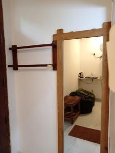 Postel nebo postele na pokoji v ubytování Rich Grove Inn