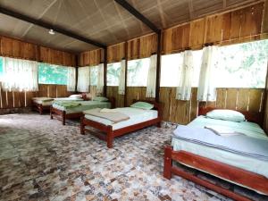 Postel nebo postele na pokoji v ubytování Retama Lodge