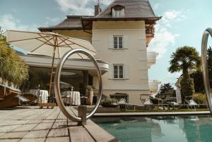 The swimming pool at or close to Hotel Villa Freiheim