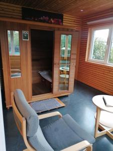 Istumisnurk majutusasutuses Bastogne Maison de vacances avec sauna