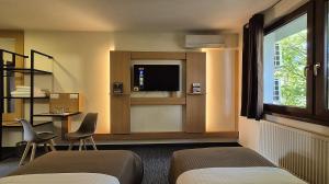 A television and/or entertainment centre at Penzion Nevada