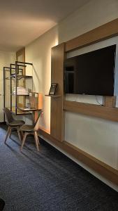 A television and/or entertainment centre at Penzion Nevada