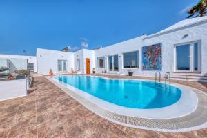a swimming pool in the backyard of a house at Casa Serena 10 Boutique- Adults Only-Breakfast Included in Mácher +145 photos