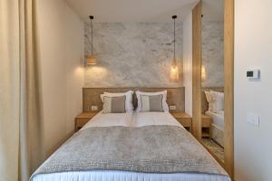 Postel nebo postele na pokoji v ubytování Hotel Serenity Timisoara