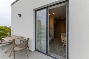 Balkón nebo terasa v ubytování Hotel Serenity Timisoara