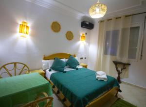 Letto o letti in una camera di Hotel Meftah Chaouen