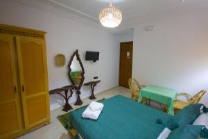 TV o dispositivi per l'intrattenimento presso Hotel Meftah Chaouen