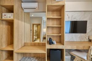 TV a/nebo společenská místnost v ubytování Hotel Serenity Timisoara