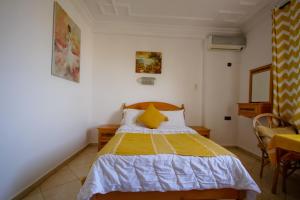 Letto o letti in una camera di Hotel Meftah Chaouen