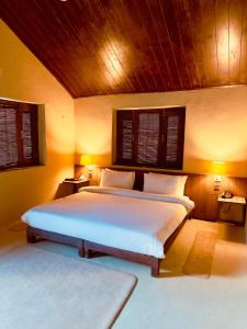 Ένα ή περισσότερα κρεβάτια σε δωμάτιο στο Sukoon Resorts