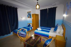 Letto o letti in una camera di Hotel Meftah Chaouen