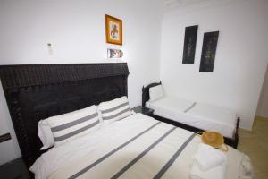 Letto o letti in una camera di Hotel Meftah Chaouen