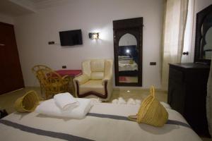 TV o dispositivi per l'intrattenimento presso Hotel Meftah Chaouen