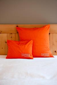 Łóżko lub łóżka w pokoju w obiekcie Hotel Donatz