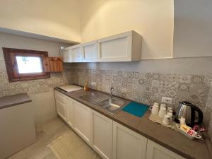 A kitchen or kitchenette at Charming Trulli