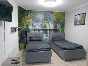 Postel nebo postele na pokoji v ubytování Monteurzimmer