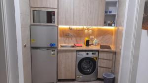 Delta Sharm luxury pool view apartment Shahrazad的厨房或小厨房