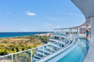 a balcony on a cruise ship with a view of the ocean at Luxury Penthouse with Panoramic Sea Views in Canet de Berenguer