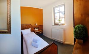 Postel nebo postele na pokoji v ubytování Haus zur Waldbrücke