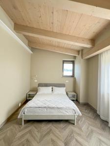 Postel nebo postele na pokoji v ubytování Tenute Masullo + 37 fotografií