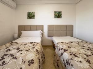 Posteľ alebo postele v izbe v ubytovaní Parque Marbella Three Bedroom Apartment
