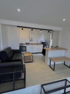 Η κουζίνα ή μικρή κουζίνα στο Balcón Austral beautiful apartment with incredible views of the mountains and the city