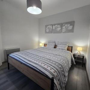Postel nebo postele na pokoji v ubytování Le Contemporain