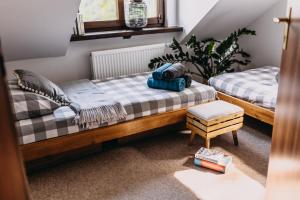 Posteľ alebo postele v izbe v ubytovaní Sowie Klimaty
