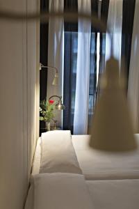 Postel nebo postele na pokoji v ubytování Hotel Trias