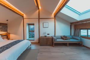 Voodi või voodid majutusasutuse Infini House toas