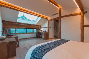 Voodi või voodid majutusasutuse Infini House toas