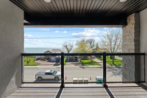 a balcony with a view of a parking lot at Luxury 171-7 Condos with Magnificent Lakeviews in Leamington