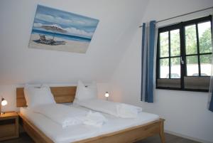 Postel nebo postele na pokoji v ubytování Zweite Heimat